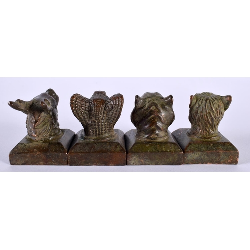 1366 - FOUR CHINESE BRONZE SEALS. 473 grams. 4 cm x 3 cm. (4)