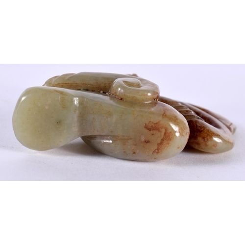 1370 - A CHINESE CARVED JADE FIGURE. 87.6 grams. 7.5 cm x 6 cm.