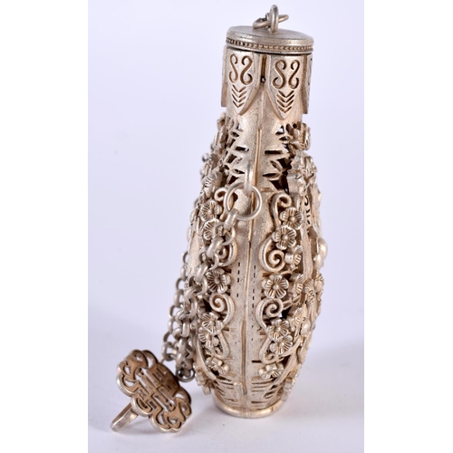 1380 - A CHINESE SNUFF BOTTLE WITH PIERCED DECORATION..  8 cm x 4.7cm x 3cm, weight 80.7g