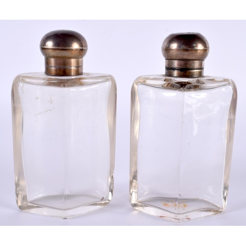 1385 - TWO SILVER TOPPED BOTTLES.  Hallmarked London 1907, 12.8 cm x 7.2 cm x 4.2 cm (2)