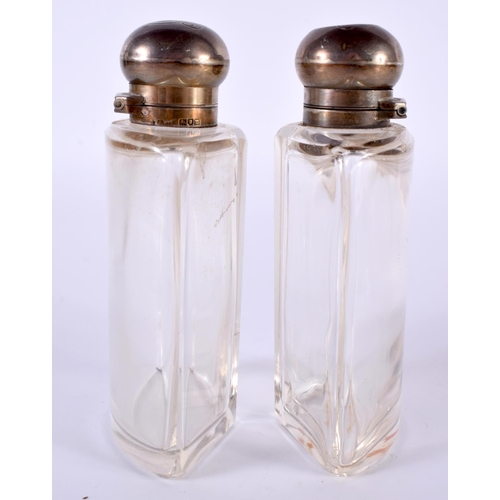 1385 - TWO SILVER TOPPED BOTTLES.  Hallmarked London 1907, 12.8 cm x 7.2 cm x 4.2 cm (2)