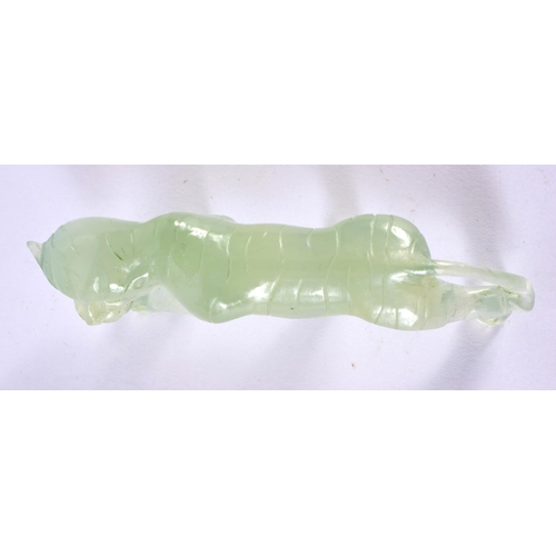 1386 - A CARVED JADE TIGER.  9cm x 2.8 cm x 2 cm, weight 44g