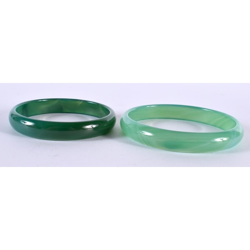 1388 - TWO GREEN JADE BANGLES.  Internal 6.5cm, total weight 49g (2)