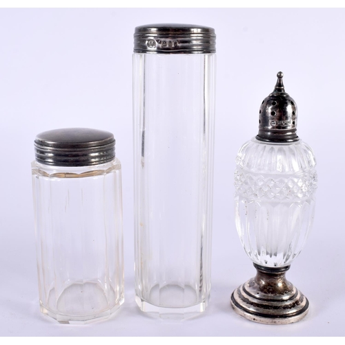 1395 - FOUR SILVER TOPPED DRESSING TABLE JARS.  Largest 12.8 cm x 3.3cm (4)