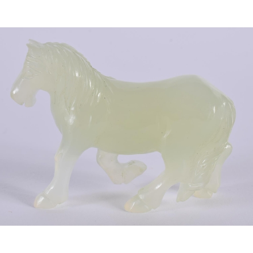 1399 - A CARVED JADE HORSE.  6.5cm x 4.7cm x 2 cm, weight 53g