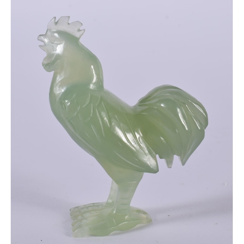 1400 - A CARVED JADE ROOSTER.  6.7cm x 5cm x 2.4cm, weight 50g