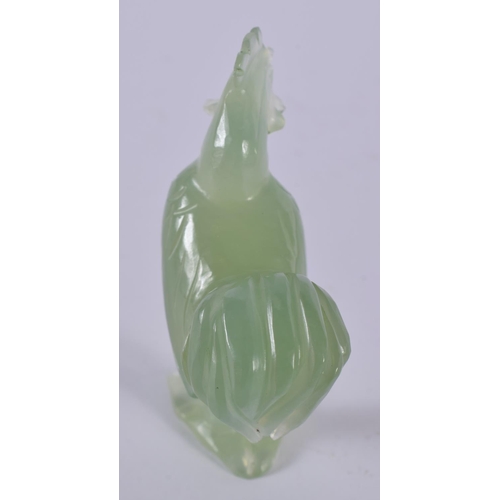 1400 - A CARVED JADE ROOSTER.  6.7cm x 5cm x 2.4cm, weight 50g