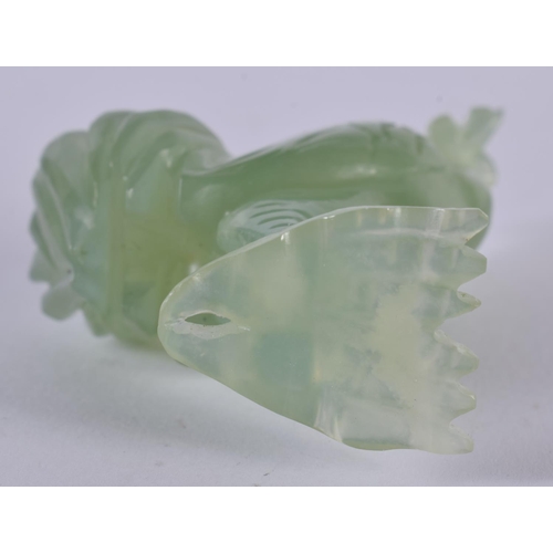 1400 - A CARVED JADE ROOSTER.  6.7cm x 5cm x 2.4cm, weight 50g