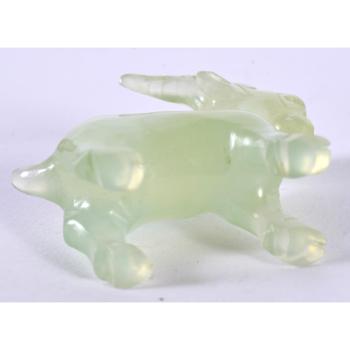 1401 - A CARVED JADE GOAT. 3.8 cm x 4.7cm x 1.7cm, weight 24g