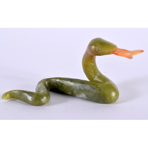 1410 - A CARVED JADE SNAKE.  8.3cm x 3.7cm x 2.9cm, weight 21.8g