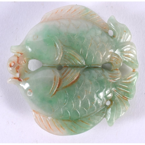 1414 - A JADE ROUNDEL CARVED WITH FISH.  5.5cm x 1.4cm, weight 56.3g