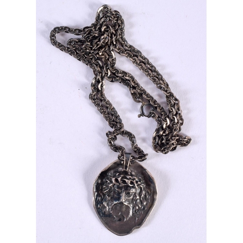 1418 - A SILVER PENDANT NECKLACE WITH THE FACE OF CHRIST WEARING A CROWN OF THORNS.  Stamped 800, Pendant 3... 