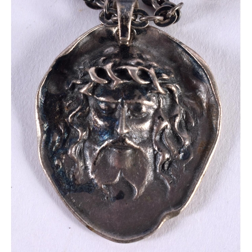 1418 - A SILVER PENDANT NECKLACE WITH THE FACE OF CHRIST WEARING A CROWN OF THORNS.  Stamped 800, Pendant 3... 