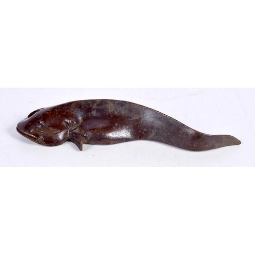 1426 - A BRONZE MODEL OF A CATFISH.  12.3cm x 4cm x 1.8 cm, weight 174g