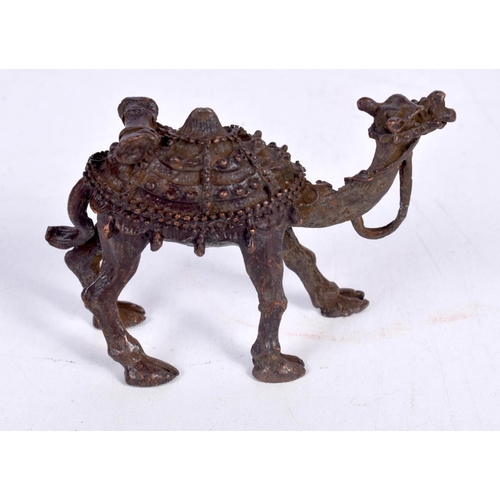 1427 - A BRONZE MODEL OF A CAMEL.  8.3cm x 3cm x 5.5cm, weight 131.4g