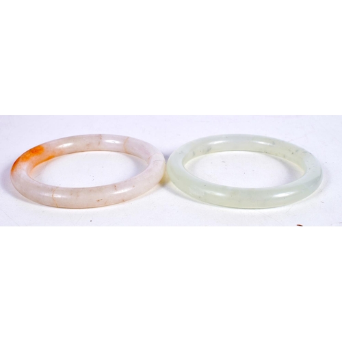 1430 - TWO CHINESE JADE BANGLES.  Largest 6 cm internal, total weight 80g (2)