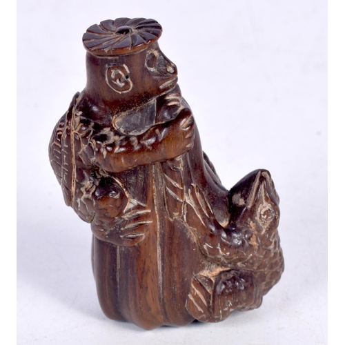 1435 - A CARVED WOOD NETSUKE IN THE FORM OF A TOAD AND A TURTLE CLIMBING A TREE STUMP.  6.1cm x 4.3cm x 2.8... 