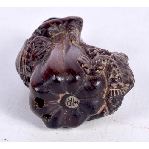 1435 - A CARVED WOOD NETSUKE IN THE FORM OF A TOAD AND A TURTLE CLIMBING A TREE STUMP.  6.1cm x 4.3cm x 2.8... 