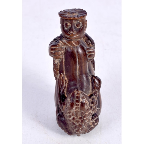 1435 - A CARVED WOOD NETSUKE IN THE FORM OF A TOAD AND A TURTLE CLIMBING A TREE STUMP.  6.1cm x 4.3cm x 2.8... 