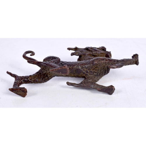 1436 - A BRONZE MODEL OF A DRAGON.  10.6 cm x 7.1cm x 2.1cm, weight 161g