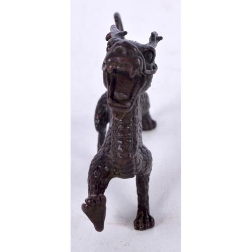 1436 - A BRONZE MODEL OF A DRAGON.  10.6 cm x 7.1cm x 2.1cm, weight 161g