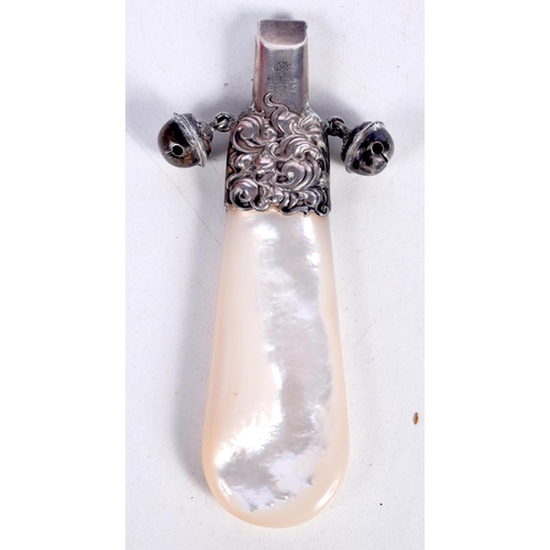 1441 - A SILVER BABIES RATTLE WITH A WHISTLE AND A MOTHER OF PEARL HANDLE.  Stamped Sterling, 10.6 cm x 4.2... 