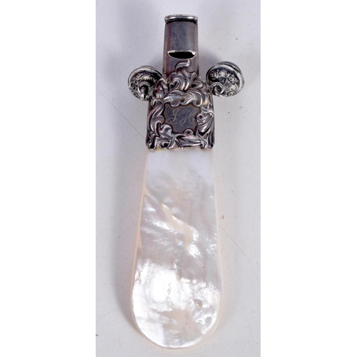 1441 - A SILVER BABIES RATTLE WITH A WHISTLE AND A MOTHER OF PEARL HANDLE.  Stamped Sterling, 10.6 cm x 4.2... 