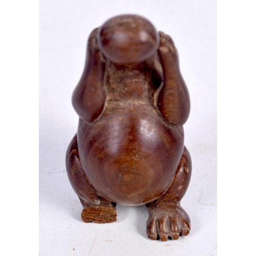 1449 - A JAPANESE CARVED HARDWOOD FIGURE OF A RAT DRINKING FROM A GOURD.  5cm x 2.8 cm x 2.5cm, weight 18.2... 