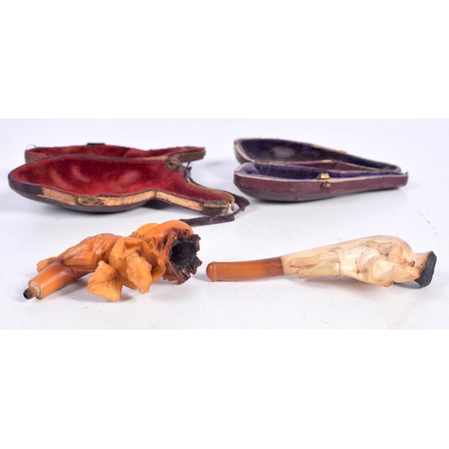 1476 - TWO CASED MEERSCHAUM PIPES, ONE CARVED AS AN ANGEL CARRYING A BASKET THE OTHER AS A VICTORIAN LADY I... 