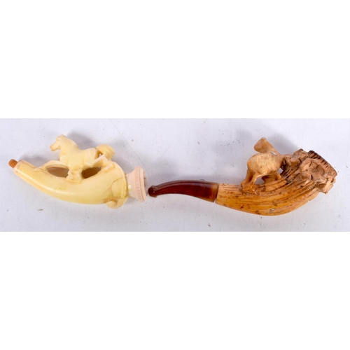 1477 - TWO CASED MEERSCHAUM PIPES, ONE CARVED WITH A DOG ON A LOG THE OTHER AS A HORSE.  Largest 8.9cm x 2.... 