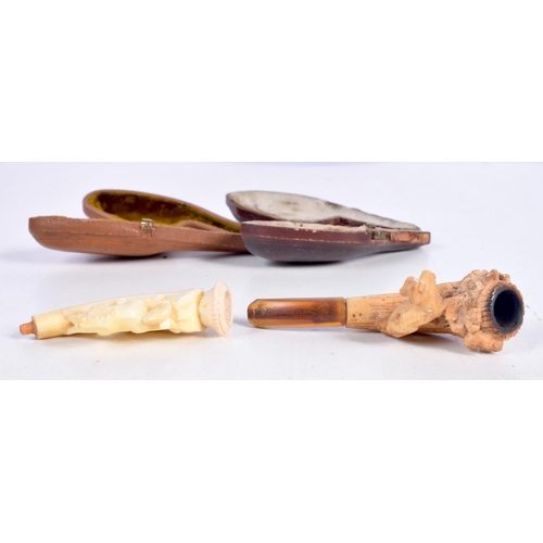 1477 - TWO CASED MEERSCHAUM PIPES, ONE CARVED WITH A DOG ON A LOG THE OTHER AS A HORSE.  Largest 8.9cm x 2.... 