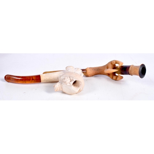 1478 - A MEERSCHAUM PIPE CARVED AS AN EAGLE CLAW WITH AN AMBER MOUTHPIECE TOGETHER WITH ANOTHER PIPE CARVED... 