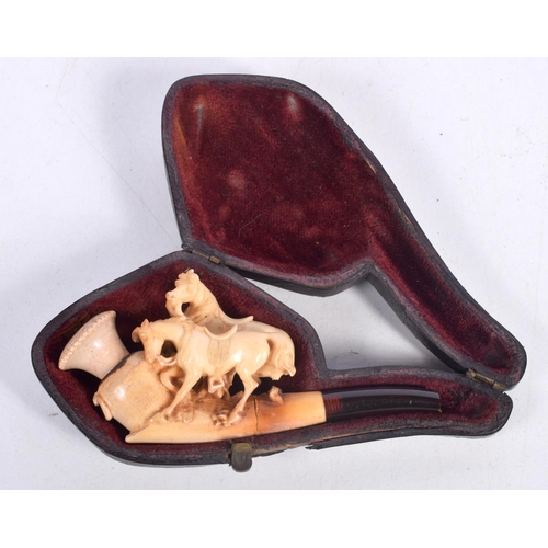 1484 - A CASED MEERSCHAUM PIPE BOWL CARVED WITH TWO HORSES WITH AN AMBER MOUTHPIECE,  9.6 cm x 4.3cm x 2.1c... 