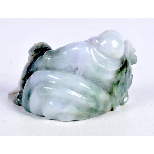 1495 - AN EARLY 20TH CENTURY CHINESE CARVED TWO TONE GREEN JADE RECLINING BUDDHA.  7.3cm x 4.2 cm x 4.6 cm,... 