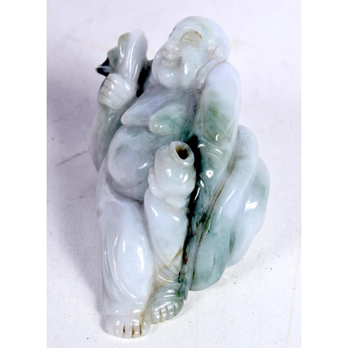 1495 - AN EARLY 20TH CENTURY CHINESE CARVED TWO TONE GREEN JADE RECLINING BUDDHA.  7.3cm x 4.2 cm x 4.6 cm,... 