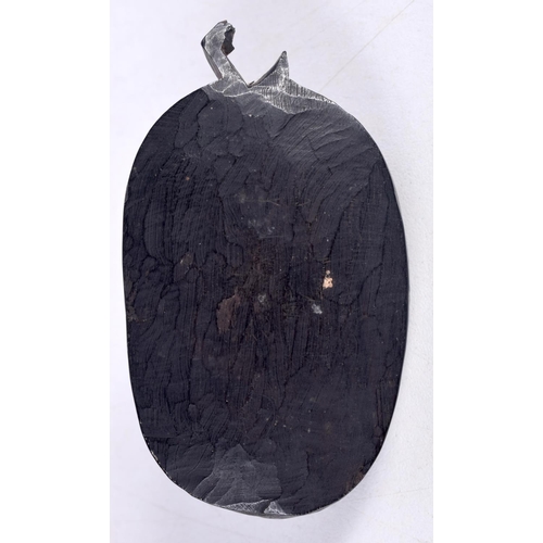 1501 - A RARE 19TH CENTURY IRISH CARVED BOG OAK PENDANT IN THE FORM OF A MASK.  7.2 cm x 4.3cm x 3cm, weigh... 