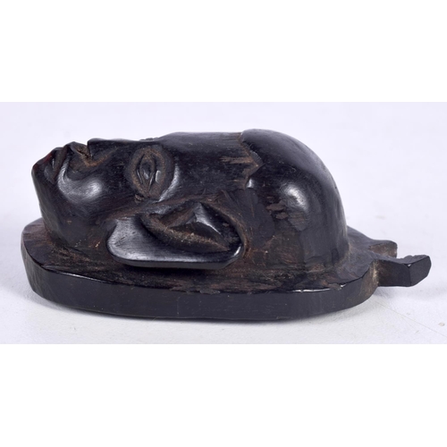 1501 - A RARE 19TH CENTURY IRISH CARVED BOG OAK PENDANT IN THE FORM OF A MASK.  7.2 cm x 4.3cm x 3cm, weigh... 