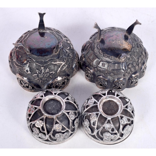 1510 - TWO WHITE METAL EMBOSSED BON BON DISHES ON THREE MERMAID TAIL FEET TOGETHER WITH TWO PIERCED WHITE M... 