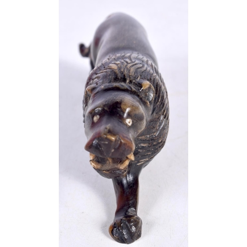 1512 - A CARVED HORN FIGURE OF A SNARLING LION.  4.8 cm x 14.4cm x 3.2 cm, weight 96g