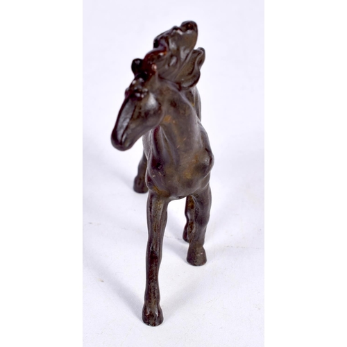 1515 - A JAPANESE BRONZE MODEL OF A HORSE.  8 cm x 8.9cm x 1.8 cm, weight 176g