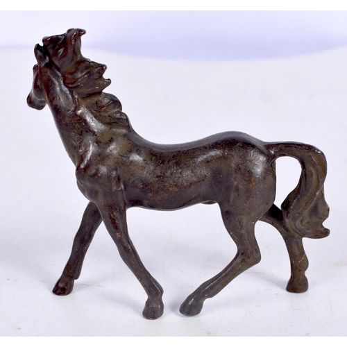 1515 - A JAPANESE BRONZE MODEL OF A HORSE.  8 cm x 8.9cm x 1.8 cm, weight 176g