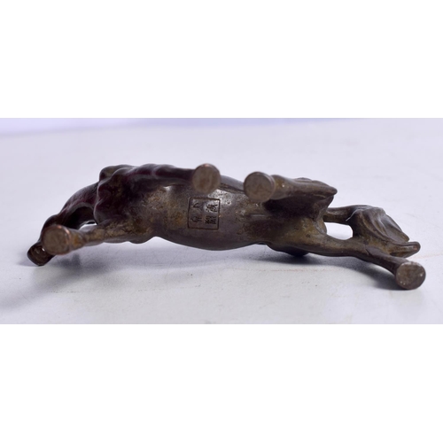 1515 - A JAPANESE BRONZE MODEL OF A HORSE.  8 cm x 8.9cm x 1.8 cm, weight 176g