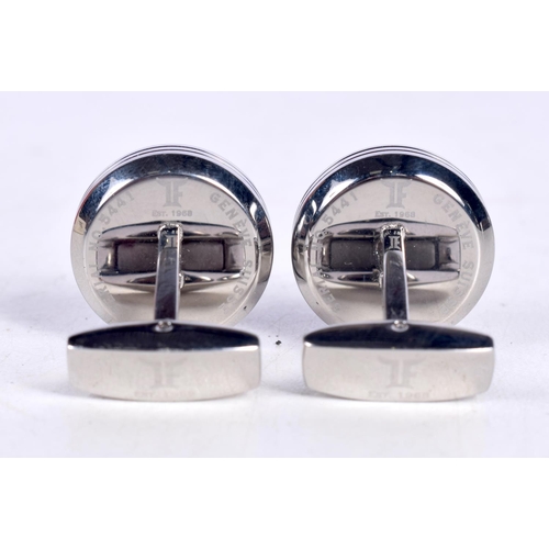 1524 - A CASED PAIR OF JEAN PIERRE TOURBILLON STEEL PLATED CUFFLINKS.  A stunning pair of modern cufflinks,... 