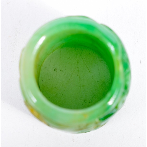 1542 - A CARVED GREEN JADE ARCHER'S RING.  3.3cm x 2.8 cm, weight 34g