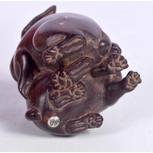 1547 - A JAPANESE NETSUKE CARVED AS 2 RABBITS.  5cm x 4.3cm x 4.3cm, weight 40g