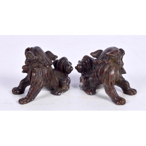 1549 - A JAPANESE BRONZE PAIR OF SHI SHI DOGS.  3.5cm 5.1cm x 3cm, total weight 196g (2)