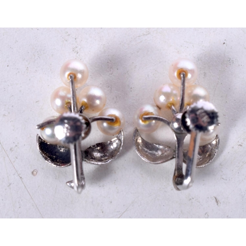 1553 - A PAIR OF 14CT GOLD AND PEARL EARRINGS.  Stamped 14K, 2.3cm x 1.5cm, weight 5.5g