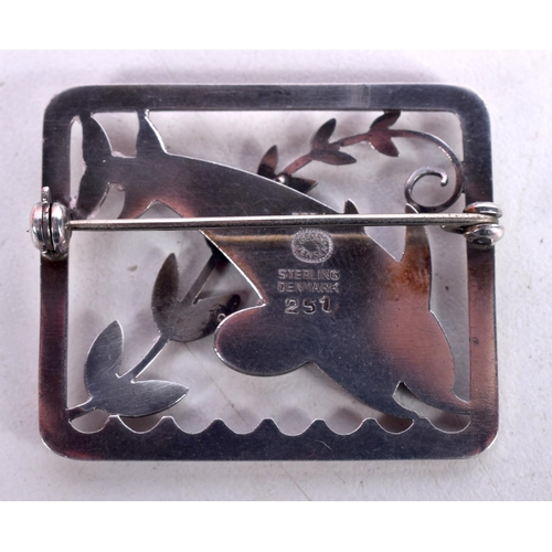 1554 - A GEORG JENSEN SILVER DOLPHIN BROOCH. 18 grams. 3.5 cm x 3 cm.