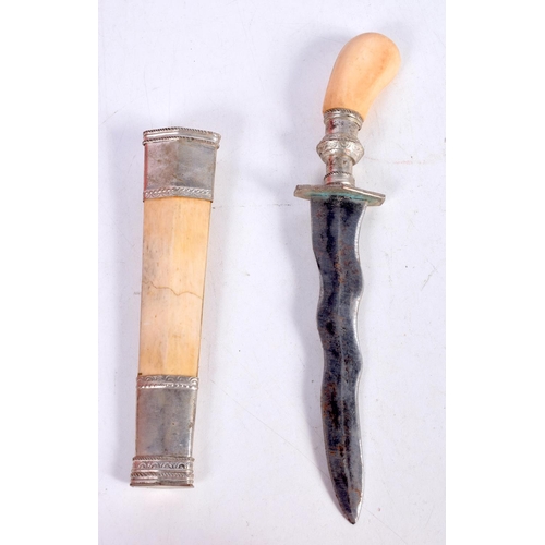 1555 - A CASED SILVER NAPKIN RING together with an early Elkington miniature candlestick, a knife & a horn ... 