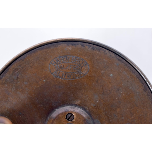 1577 - A HARDY BROTHERS FISHING REEL. 7.75 cm x 3.75 cm.